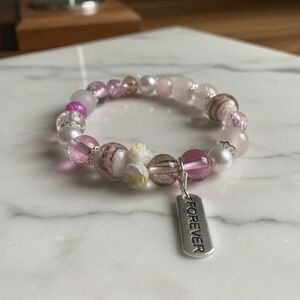 Elegant Pink Beaded Bracelet with Silver Charm